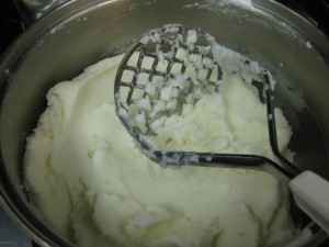 Mashed potatoes using my favourite masher.